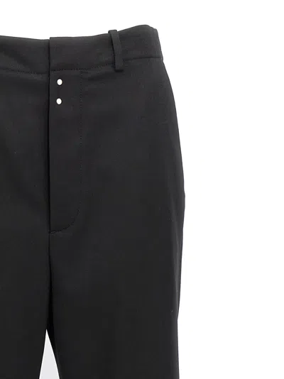 Mm6 Maison Margiela Mm6 By Maison Margiela Flared Black Wool Blend Pants With Contrast Stitching