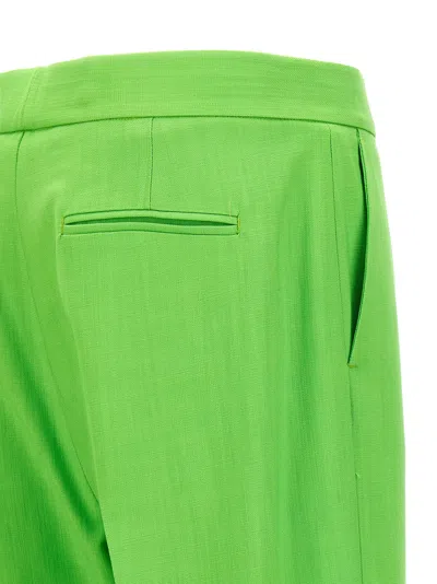 Msgm Flared Trousers With Pockets And Pleats In Green