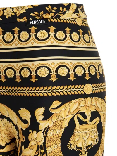 Versace Gold And Black Stretch Fabric Leggings With Baroque Heriatge Print