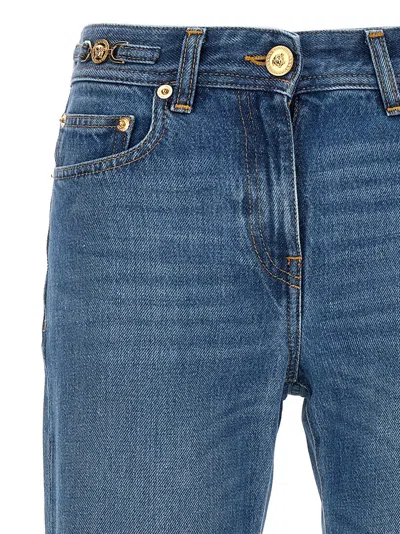 Versace Cotton Bootcut Denims With Logoed Morsets 32cm