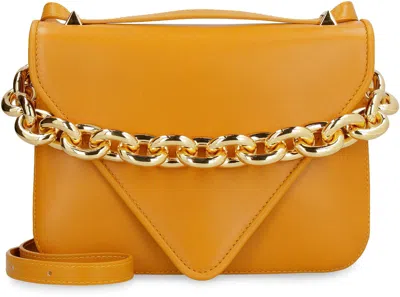 Shop Bottega Veneta Mount Leather Envelope Bag In Mustard