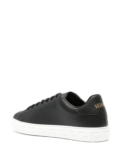 Shop Versace Sneakers In Black