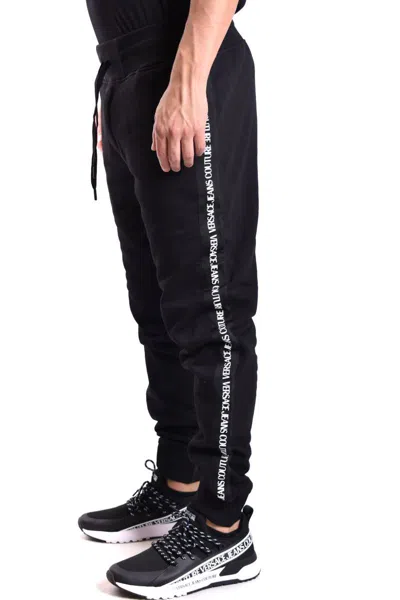 Shop Versace Jeans Couture Trousers In Black