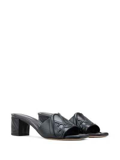 Alexander Mcqueen Black Slip-on Sandals With Embossed Logo In Padded Leather Woman