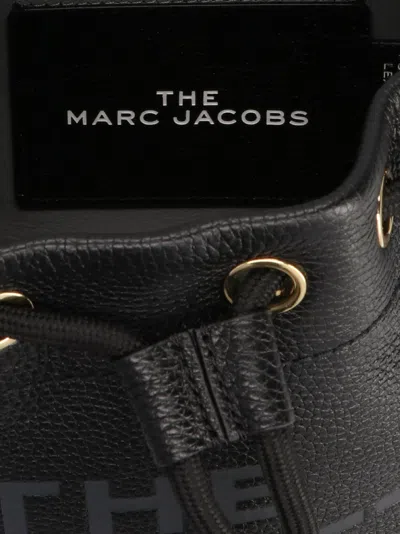 Marc Jacobs The Leather Bucket Black Handbag With Drawstring And Front Logo In Hammered Leather