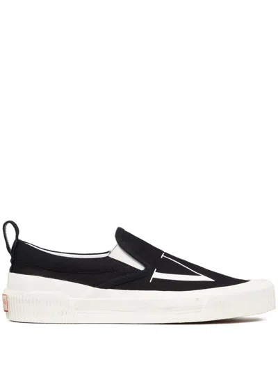 Shop Valentino Garavani Vltn Canvas Slip On