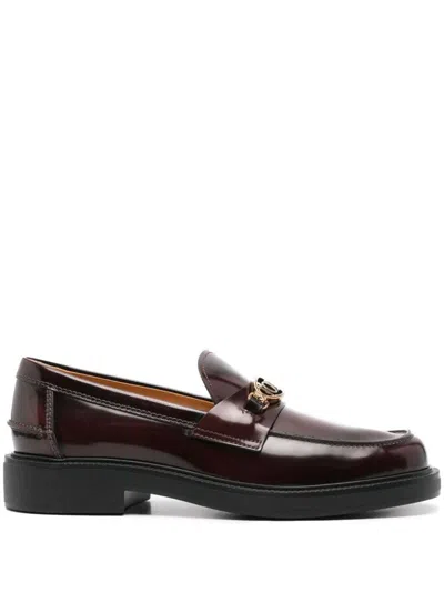 Tod's Logo-plaque Leather Loafers In Brown