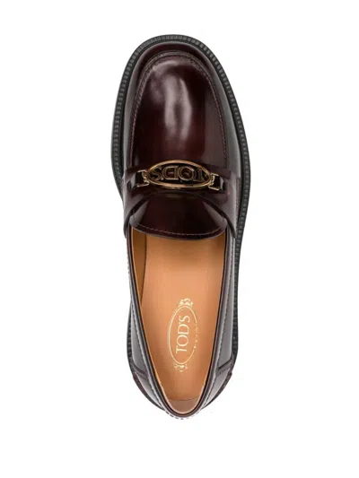 Tod's Logo-plaque Leather Loafers In Brown