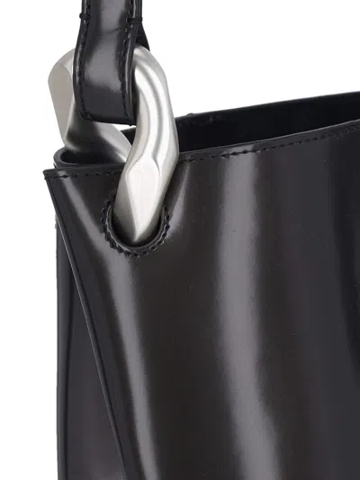 Jw Anderson Shoulder Bag With Metal Hardware And Seam Detailing In Black