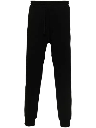 Shop Diesel Trousers Black