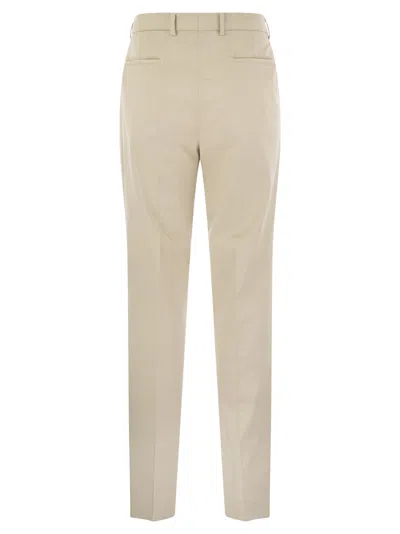 Shop Brunello Cucinelli Garment Dyed Leisure Fit Trousers In American Pima Comfort Cotton With Pleats