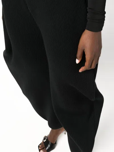 Shop Alaïa Alaia Round Wool Blend Trousers