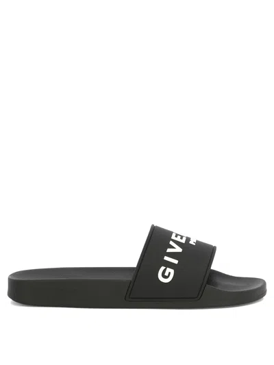 Shop Givenchy "slide" Sandals In Black