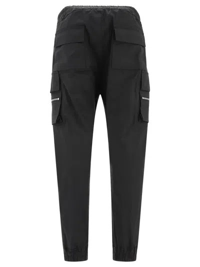 Shop Rick Owens "mastodon Cargo" Trousers In Black