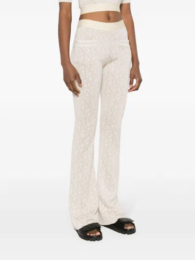 Shop Palm Angels Monogram Jacquard Knit Trousers