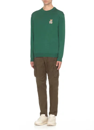 Shop Moschino Sweaters Green