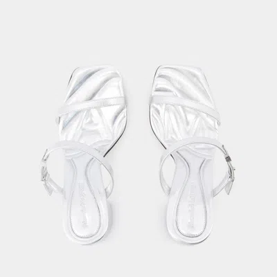 Alexander Mcqueen Seal Heeled Sandals In Silver