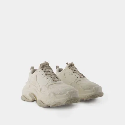 Shop Balenciaga Triple S Sneakers In Beige