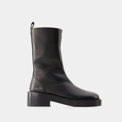 Shop Courrèges Zipped Ankle Boots In Black