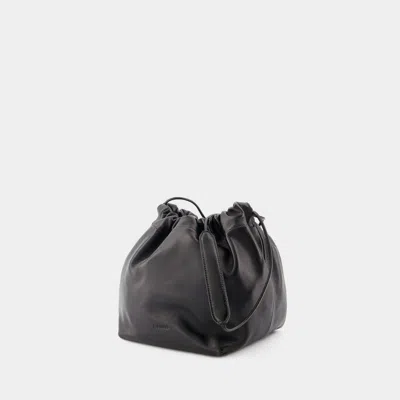 Shop Jil Sander Dumpling Shoulder Bag In Black