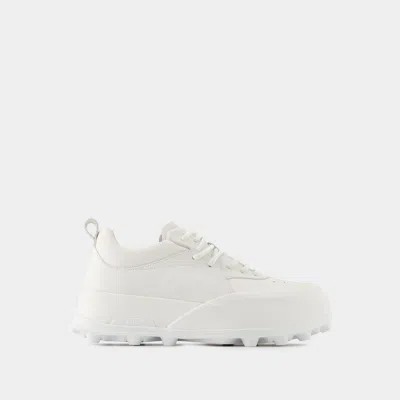 Jil Sander Orb White Low Top Sneakers With Cleated Sole In Leather In White