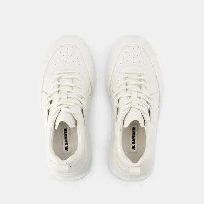 Jil Sander Orb White Low Top Sneakers With Cleated Sole In Leather In White