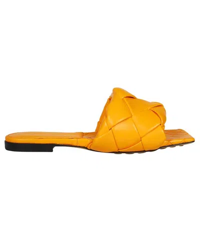 Bottega Veneta The Lido Flat Mules In Intrecciato Nappa Lambskin In Orange