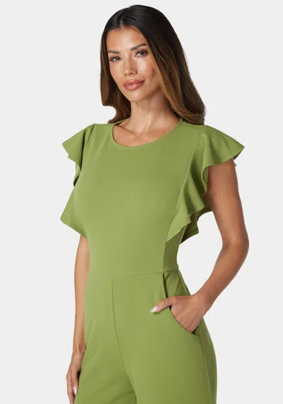 Bebe Flutter Sleeve Core Jumpsuit In Olive