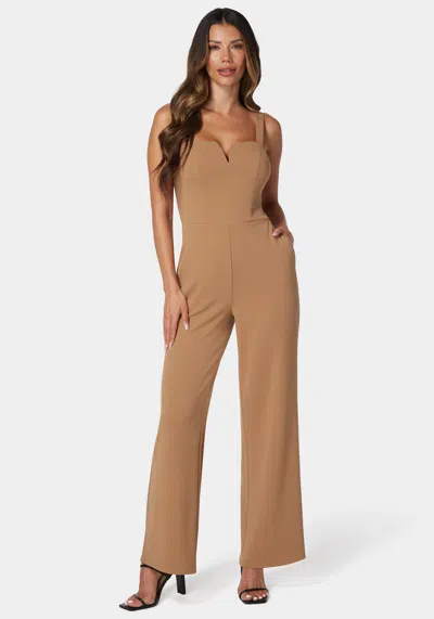 Bebe V Wire Core Jumpsuit In Camel