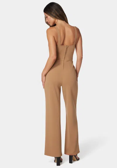 Bebe V Wire Core Jumpsuit In Camel