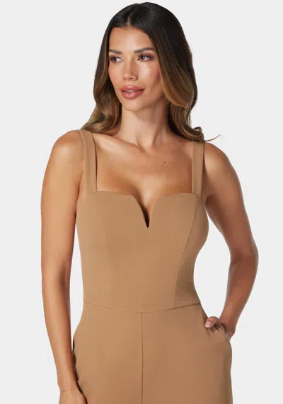 Bebe V Wire Core Jumpsuit In Camel