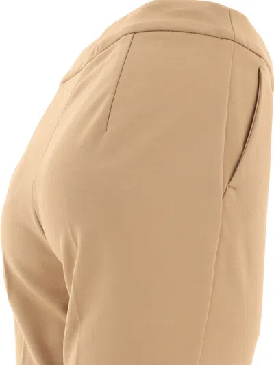 Shop Max Mara Viscose Jersey Trousers In Beige