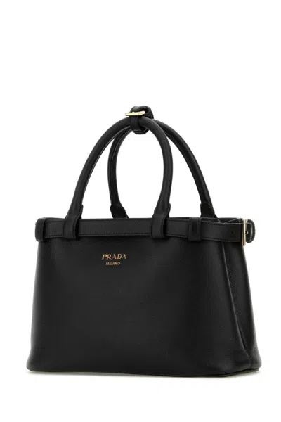 Shop Prada Handbags. In Black