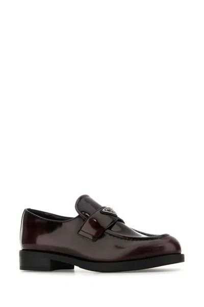 Prada Leather Logo Slip-on Loafers In Purple