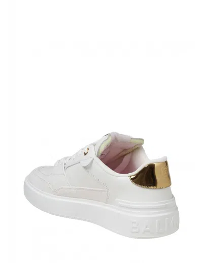 Shop Balmain Calfskin Sneakers In White / Gold