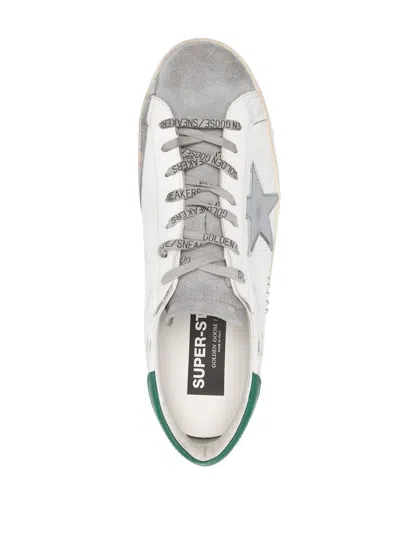 Shop Golden Goose Super Star Leather Sneakers