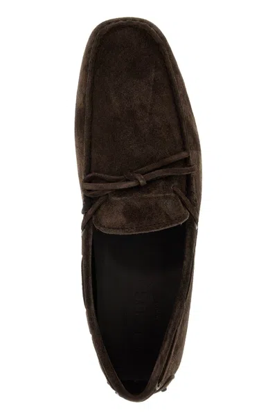 Shop Tod's Gommino Loafers With Laces