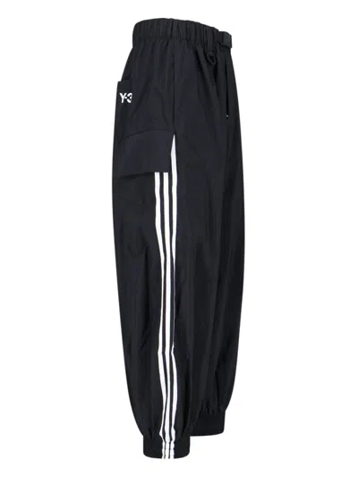 Shop Y-3 Trousers In Black