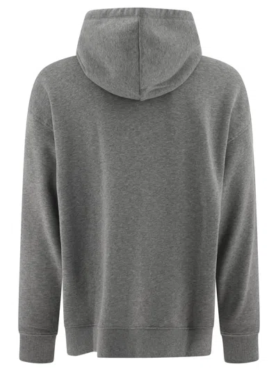 Shop Valentino Hoodie With Metallic V Detail