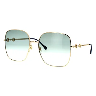 Shop Gucci Eyewear Sunglasses In Gold