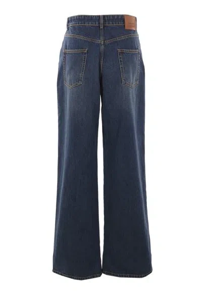 Shop Alexander Mcqueen Jeans In Dark Stonewash