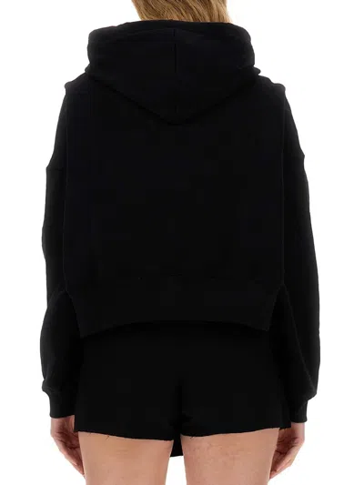 Shop Msgm Logo Print Cotton Hoodie In Black