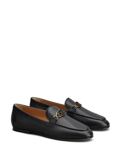 Shop Tod's Flat Shoes In Black