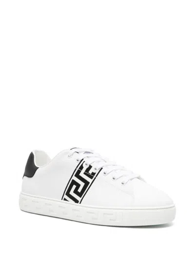 Shop Versace Sneakers In White