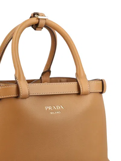 Shop Prada Handbags In Brown