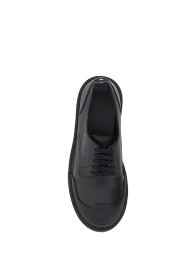 Marni Dada Rubber-trimmed Leather Brogues In Black