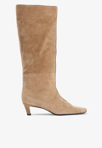 Shop Totême 55 Knee-high Suede Boots In Beige