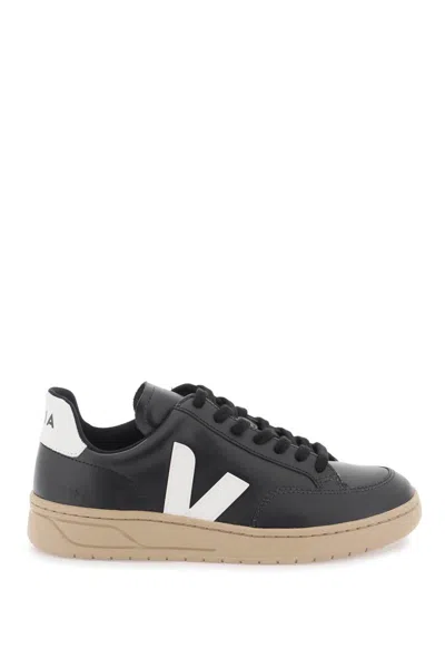 Shop Veja Leather V-12 Sneakers In Black