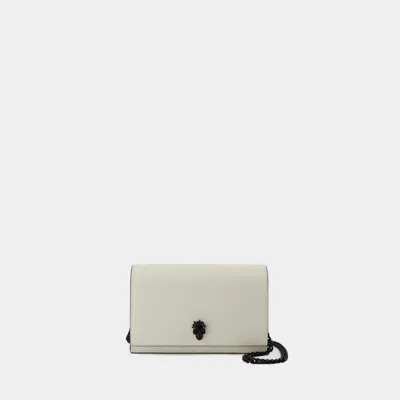 Shop Alexander Mcqueen Small Skull Crossbody In Neutral