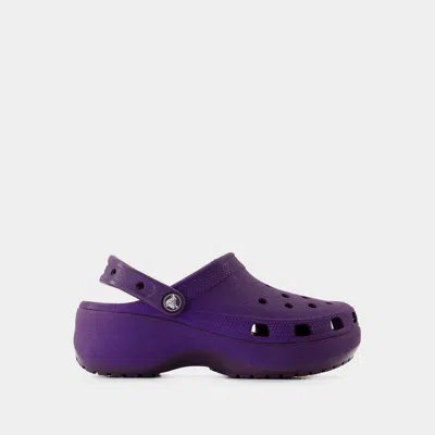 Shop Crocs Classic Platform Glitter Sandals In Purple